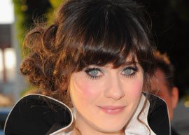 Zoeey Deschanel usando coque lateral