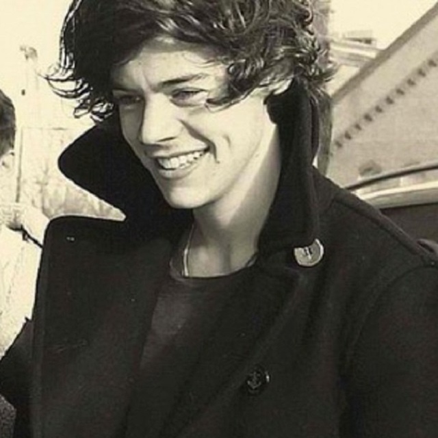Cantor Harry Styles sorrindo
