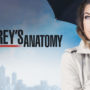 personagem de greys anathomy segurando guarda-chuva