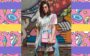 Flavia Pavanelli com vestido colorido e estampado