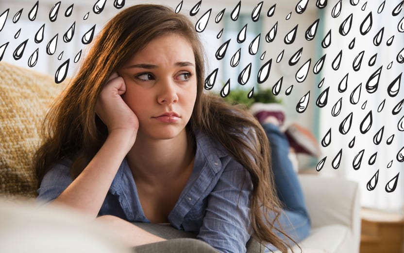Sua ansiedade é doença? Menina triste deitada no sofá