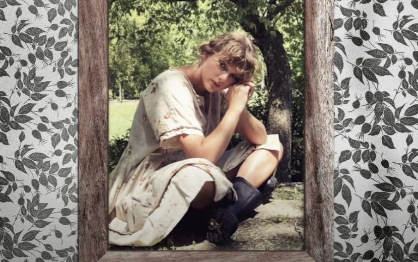 Taylor Swift faz ponta divertida com famoso cardigã em comercial; vem ver!